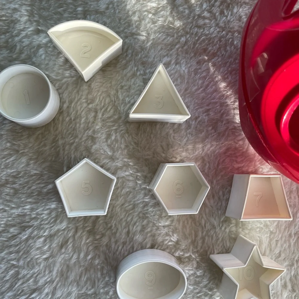 Tupperware Special Edition Red & White Shape O Ball by TUPPERWARE